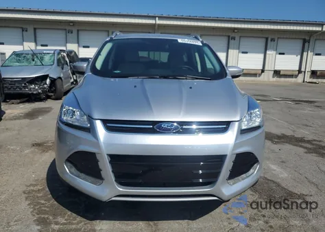 2016 Ford Escape Titanium z USA, uszkodzony, nr VIN 1FMCU0J93GUC64715